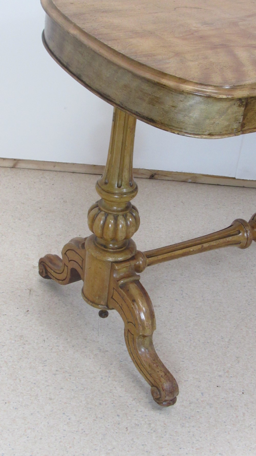 A Victorian satin walnut library table featuring a rectangular top with rounded corners, a pulled-out frieze drawer, turned pedestal legs, and a low central stretcher base. View XIV