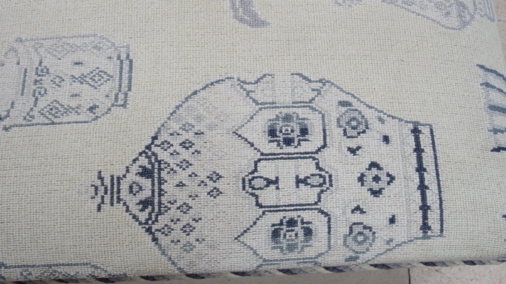 lovely upholstered ottoman View X
