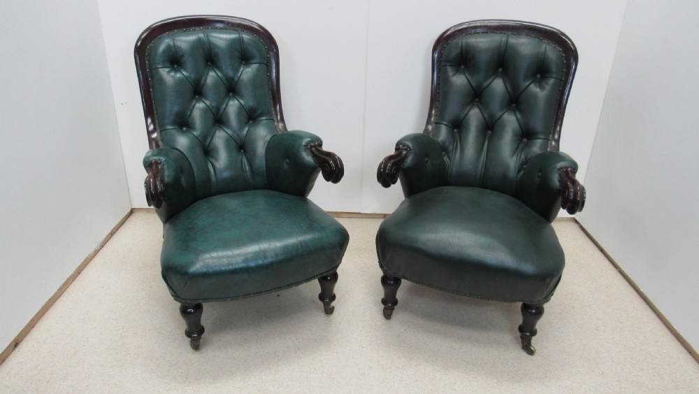 Pair of leather library chairs 