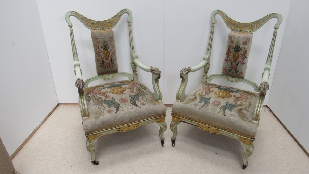 Superb pair of painted decorative Italian lounge chairs