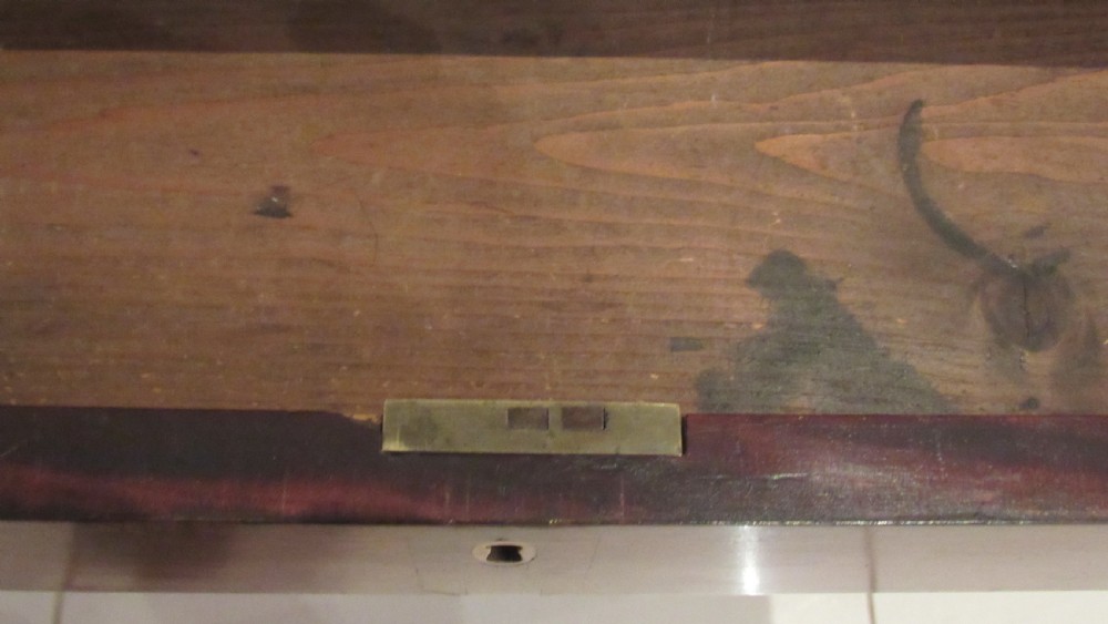 A Georgian mahogany chamber table featuring a rectangular top with a central flap, a single frieze drawer with brass hardware, and spiral turned legs on brass castors. View XXII