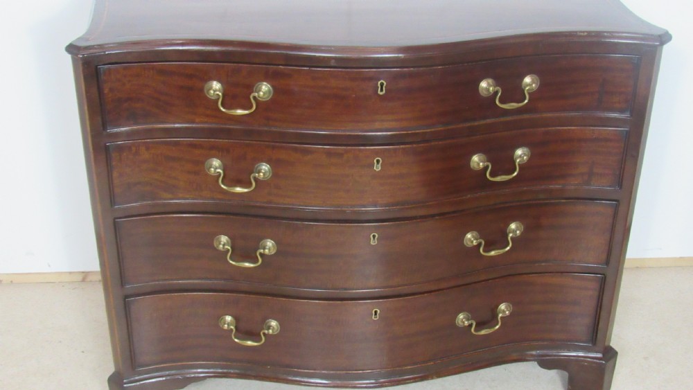 Georgian mahogany serpentine chest of drawers  View II