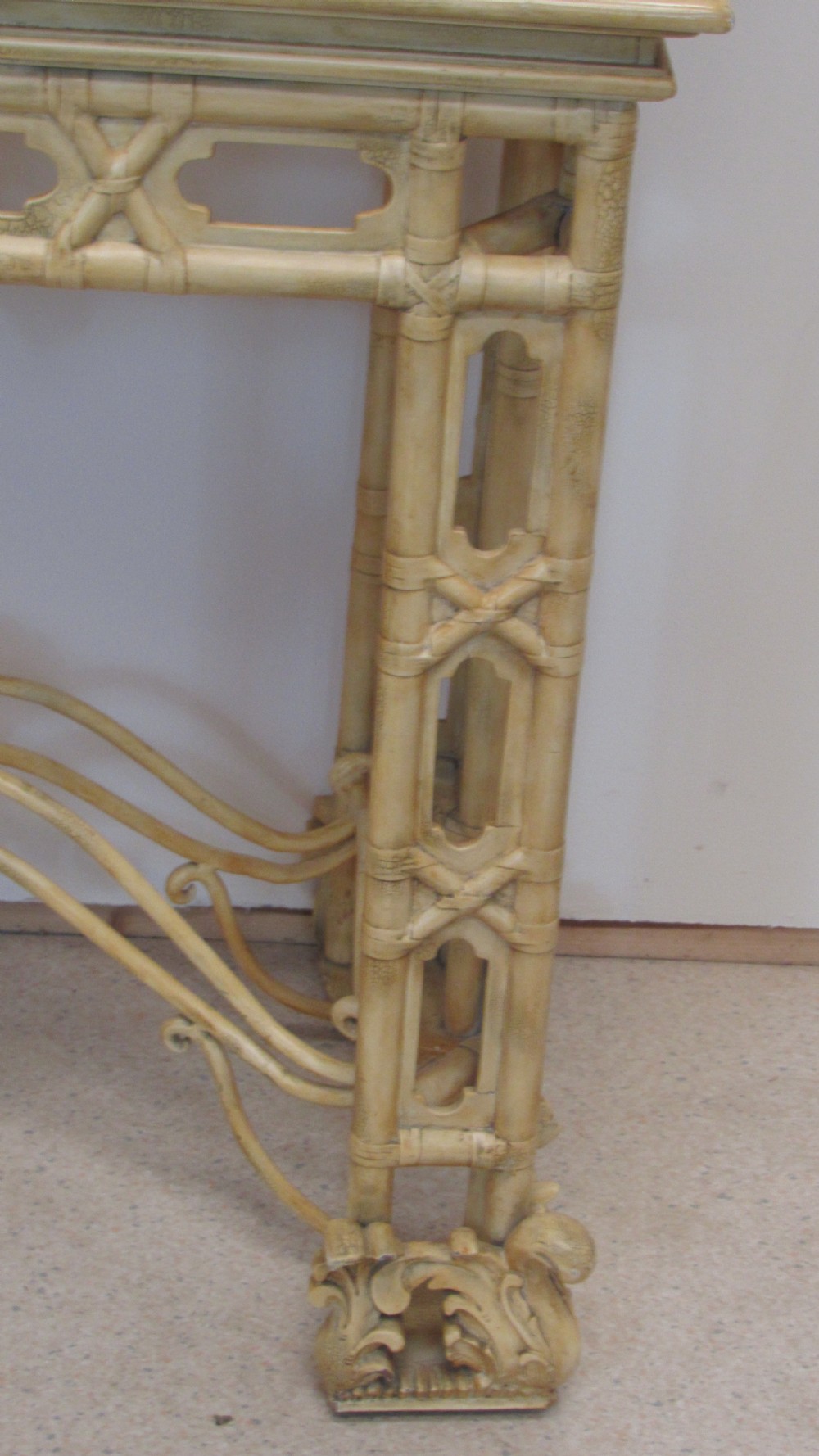 A cream painted Chinoiserie display cabinet on a stand featuring a pagoda-style roof, diamond lattice glass doors, and faux bamboo detailing. View IV