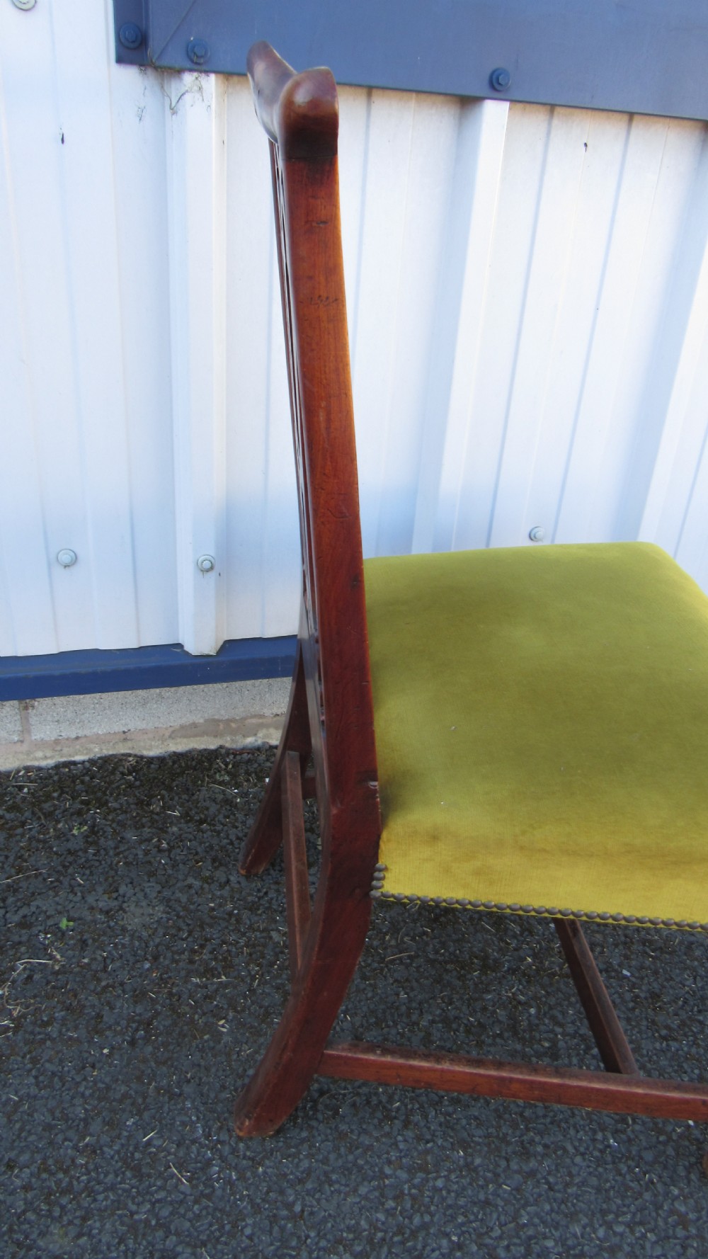 Set of four Georgian mahogany dining chairs featuring carved pierced splats and green velvet upholstered seats. View VIII
