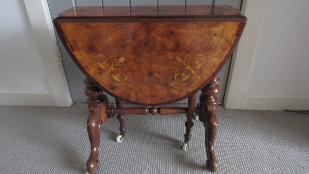 Superb walnut inlaid baby Sutherland table
