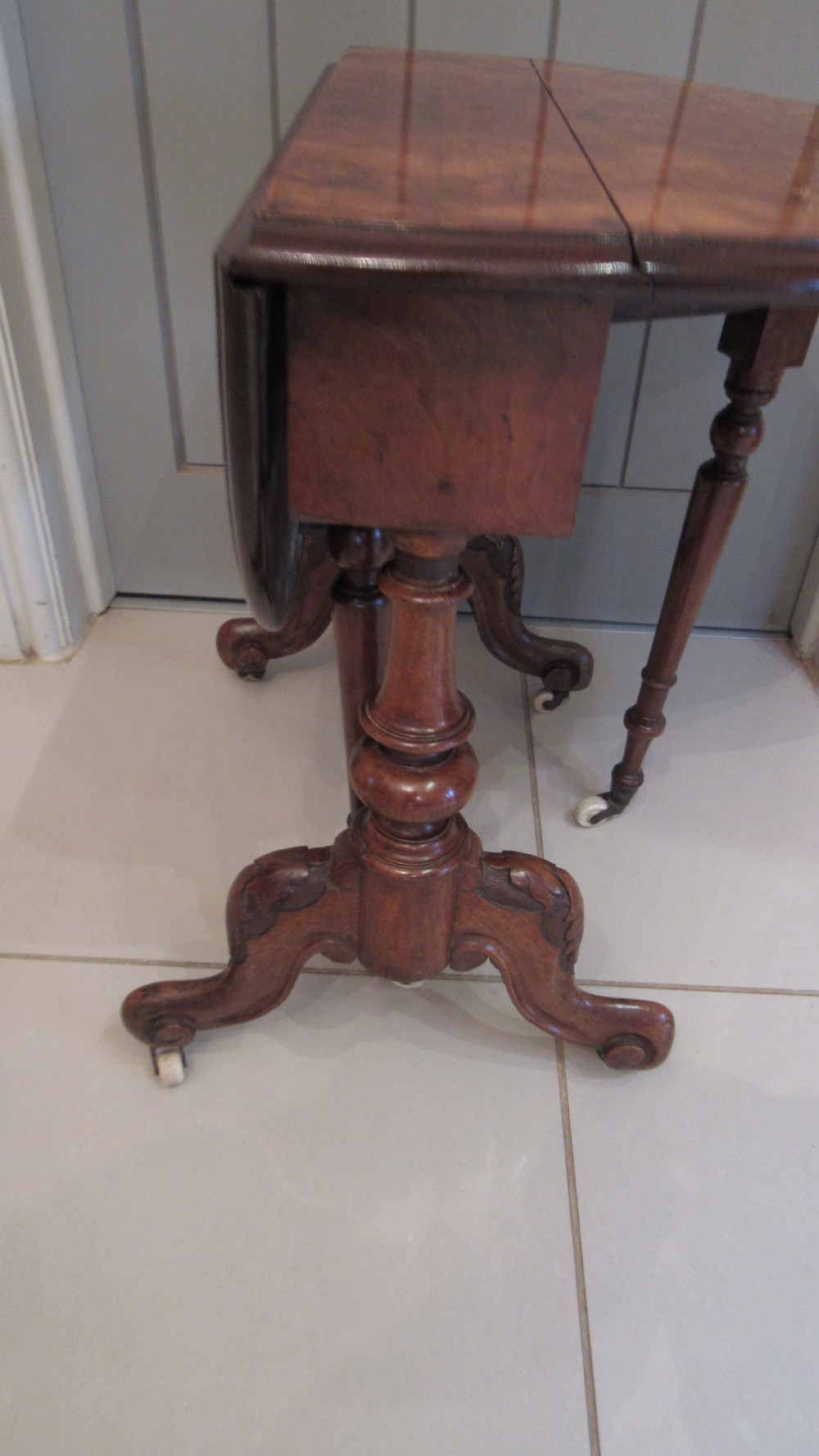 Superb walnut inlaid baby Sutherland table View V
