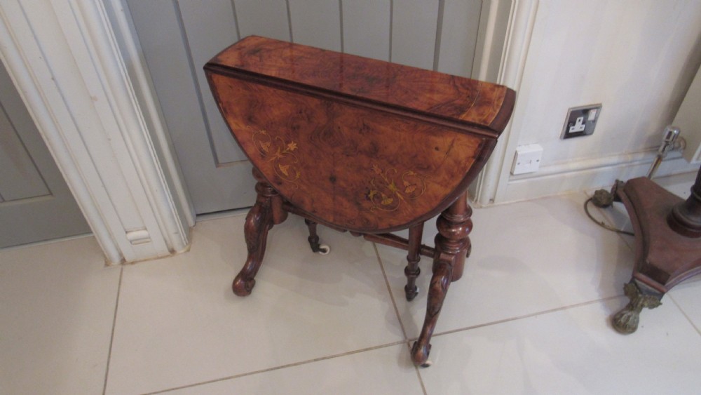 Superb walnut inlaid baby Sutherland table View VII