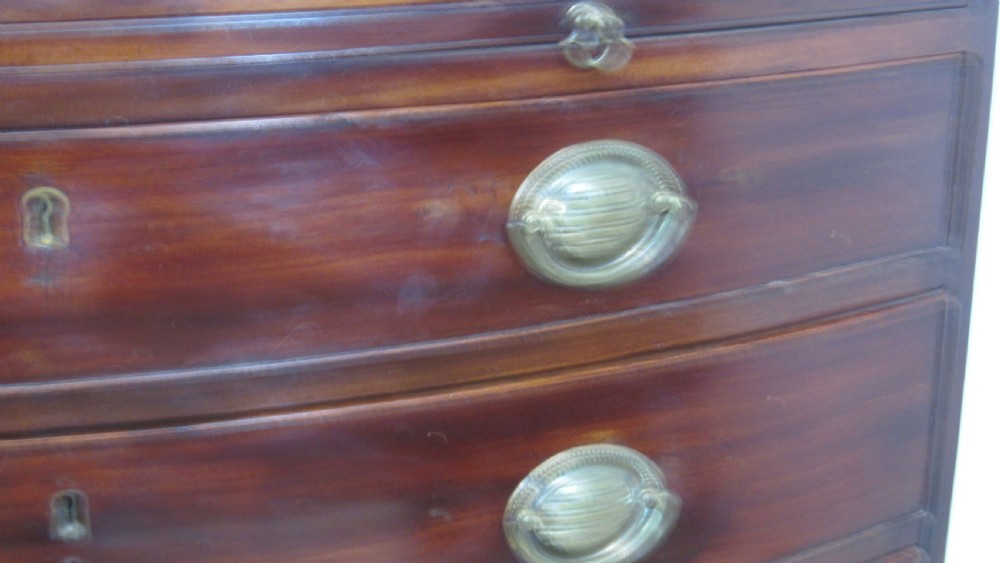 Elegant small bow front chest with a brushing slide View IV