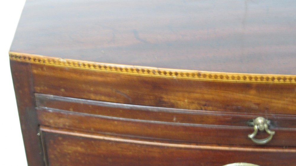Elegant small bow front chest with a brushing slide View VI