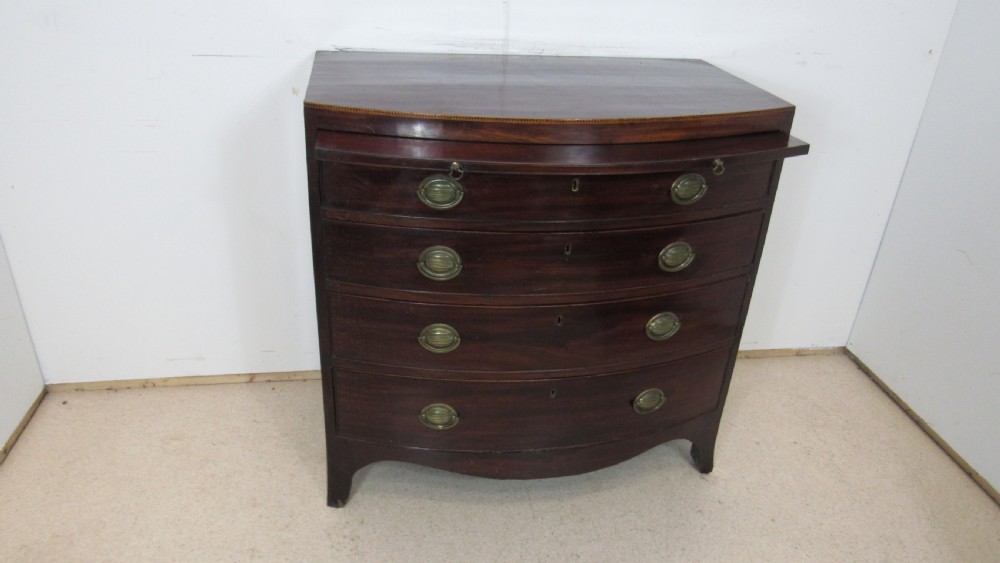 Elegant small bow front chest with a brushing slide View VII