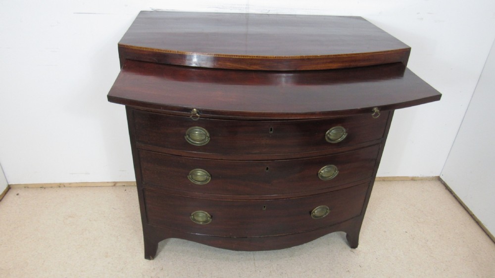 Elegant small bow front chest with a brushing slide View VIII