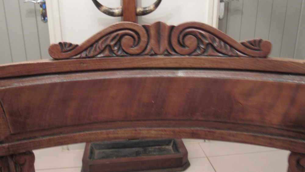 Pair of Regency mahogany carver chairs featuring curved scroll arms, reeded front legs, and patterned fabric seat upholstery. View XI