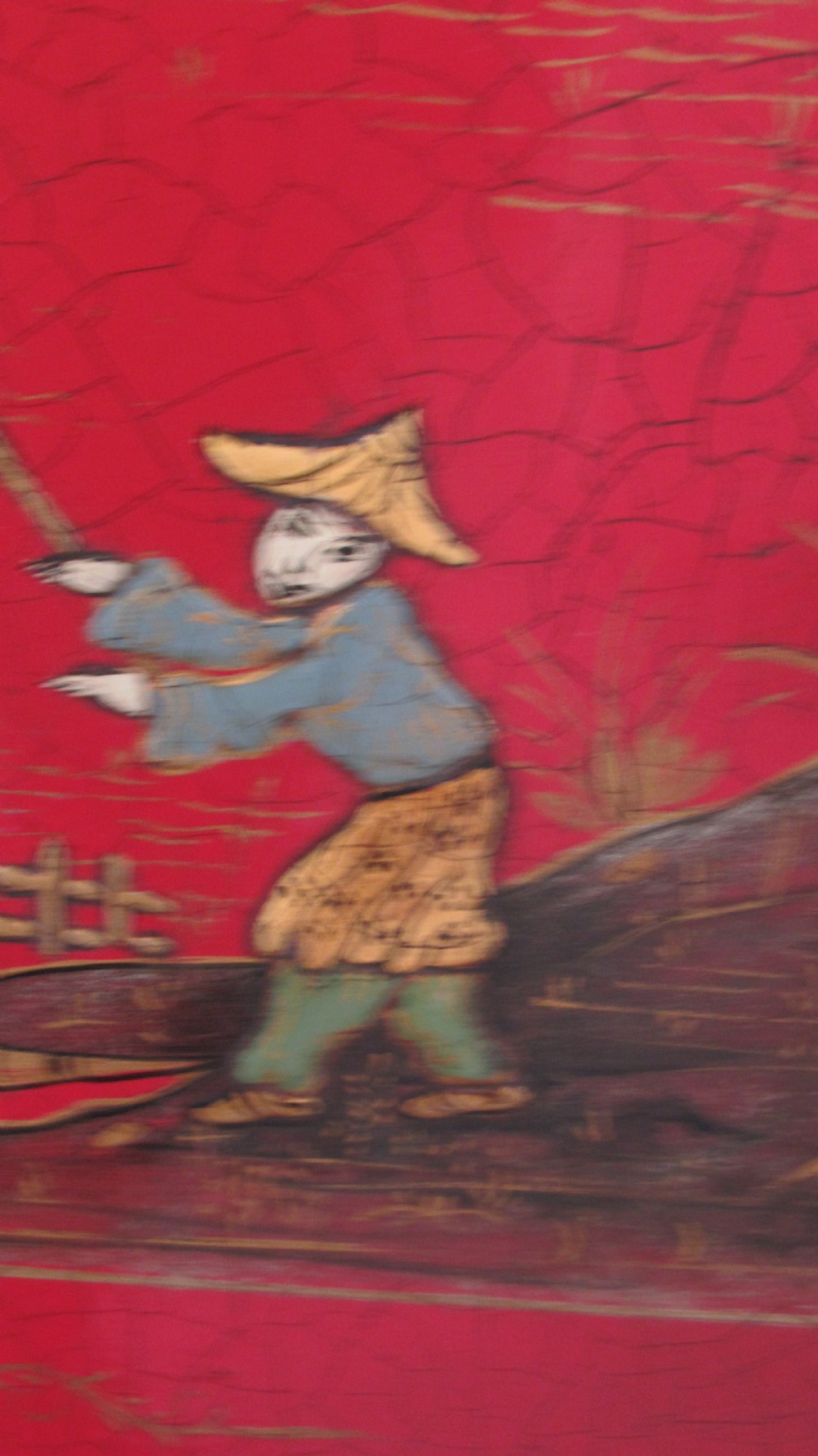 A red lacquered chinoiserie cocktail cabinet decorated with gilt landscapes and figures, featuring ornate brass hinges and set on a carved timber stand with cabriole legs. View XII