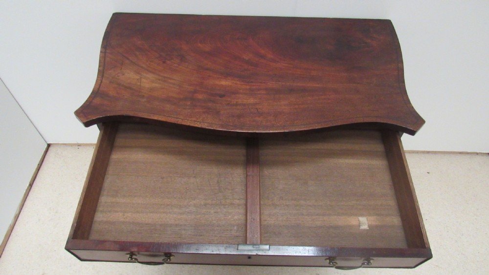 Georgian serpentine chest  View XIV