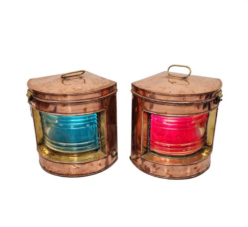 A VERY RARE PAIR OF EARLY 20TH CENTURY COPPER AND BRASS SHIPS LANTERNS