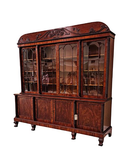 A VERY RARE EARLY 19TH CENTURY IRISH FLAME MAHOGANY BOOKCASE - ADDITIONAL PHOTO 1