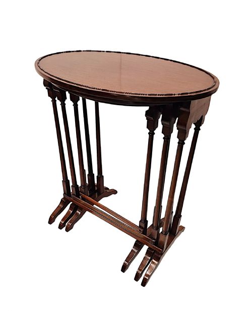 A VERY FINE EDWARDIAN NEST OF THREE OVAL TABLES - ADDITIONAL PHOTO 1