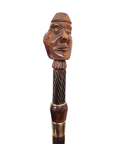 A VERY RARE 19TH CENTURY GADGET NUT CRACKER WALKING CANE WITH A PAIR OF CARVED HEADS - ADDITIONAL PHOTO 3
