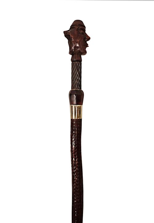 A VERY RARE 19TH CENTURY GADGET NUT CRACKER WALKING CANE WITH A PAIR OF CARVED HEADS - ADDITIONAL PHOTO 4