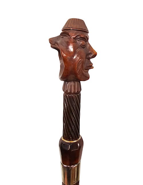 A VERY RARE 19TH CENTURY GADGET NUT CRACKER WALKING CANE WITH A PAIR OF CARVED HEADS - ADDITIONAL PHOTO 6