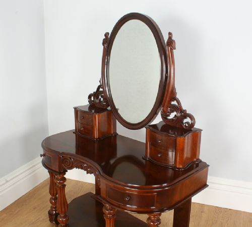 fig 1. Flame Mahogany Serpentine Victorian Duchess Dressing Table (Circa 1860)