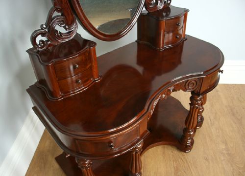 fig 2. Flame Mahogany Serpentine Victorian Duchess Dressing Table (Circa 1860)