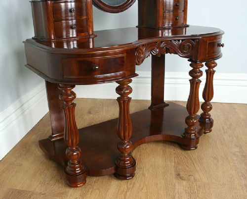 fig 7. Flame Mahogany Serpentine Victorian Duchess Dressing Table (Circa 1860)