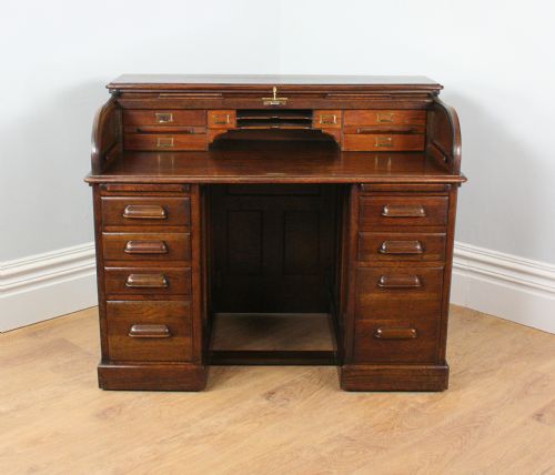 fig 1. 4ft 2” Victorian Oak Roll Top Pedestal Desk (Circa 1880 - 1900)
