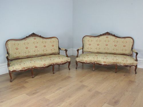 Pair of Antique French Louis XVI Revival Walnut Couches (Circa 1880)