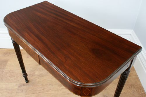 fig 4. George IV Inlaid Figured Mahogany “D” End Tea Table (Circa 1830)