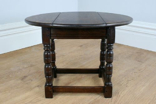 fig 2. Charles II Style Oak Swivel Drop Leaf Coffee Table (Circa 1890)