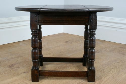 fig 4. Charles II Style Oak Swivel Drop Leaf Coffee Table (Circa 1890)