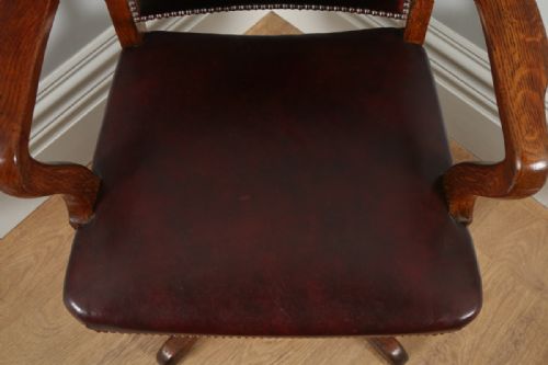 fig 10. Antique English Edwardian Oak and Red Leather Revolving Office Desk Armchair (Circa 1920)