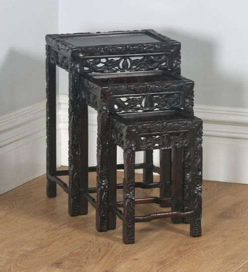 Antique Chinese Oriental Qing Dynasty Set of Three Carved Hardwood Nest of Tables (Circa 1900)