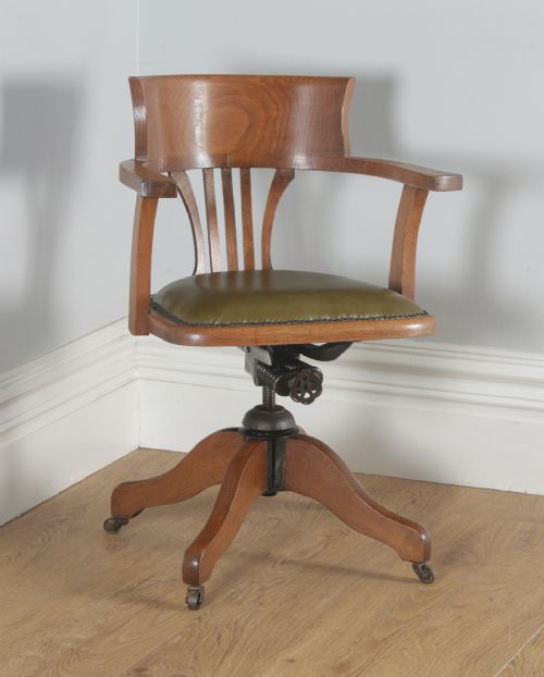 Antique English Edwardian Oak and Green Leather Revolving Swivel Office Desk Arm Chair (Circa 1910)