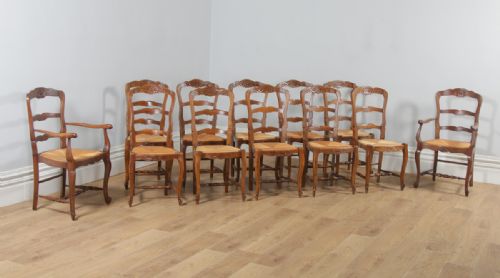 Antique Set of 12 French Louis XV Style Oak Ladder Back Rush Seat Kitchen Dining Chairs (Circa 1910)