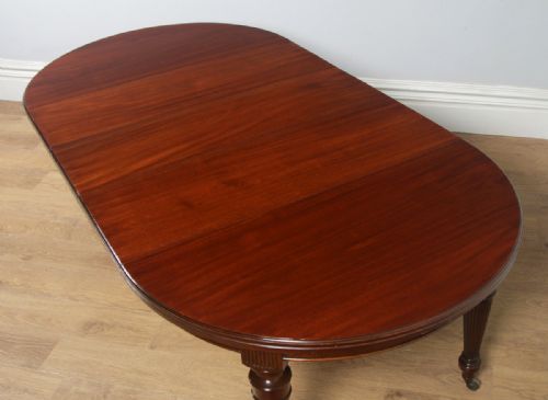 fig 7. Antique English Victorian Mahogany Round Extendable 8 Seat Dining Table (Circa 1890)