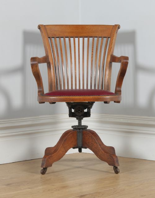 fig 1. Antique English Edwardian Oak & Burgundy Red Leather Revolving Office Desk Arm Chair by Phillips & Sons of Bristol (Circa 1910)