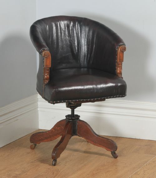 Antique English Edwardian Oak & Red Oxblood Leather Style Revolving Adjustable Office Desk Arm Tub Chair (Circa 1910)