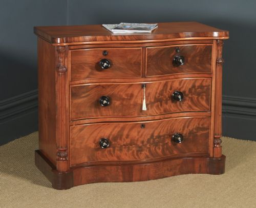 Antique English Victorian Flame Mahogany Serpentine Chest of Drawers (Circa 1860)