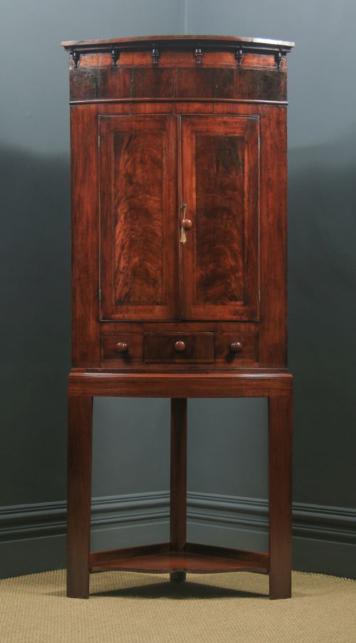 fig 1. Antique English Georgian Flame Mahogany Floor Standing Bow Front Corner Cupboard on Stand (Circa 1820)