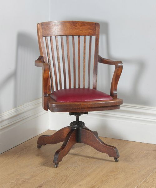 Antique English Edwardian Oak & Burgundy Red Leather Revolving Office Desk Arm Chair (Circa 1910)