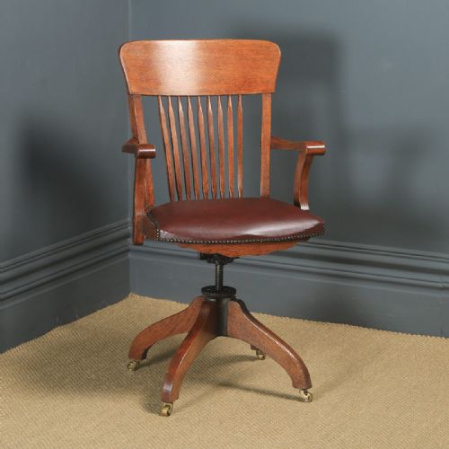 Antique American Edwardian Art Nouveau Oak Revolving Office Desk Arm Chair by Johnson Chair Co. (Circa 1910)
