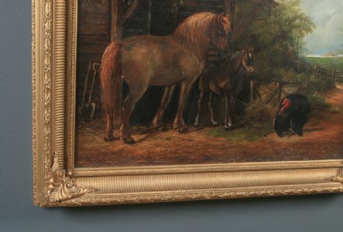 fig 5. A Victorian oil painting depicting a horse, foal, and turkey outside a wooden barn structure housed in a gilded frame.