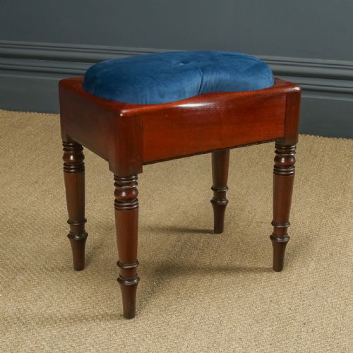 fig 1. Here is a fine quality antique English Georgian mahogany stool, with a newly upholstered shaped seat, incorporating a storage area, circa 1820, in excellent condition.