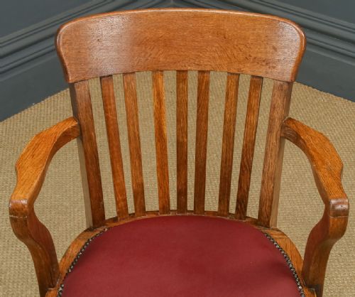 fig 1. Antique English Edwardian Oak & Red Leather Revolving Office Desk Arm Chair (Circa 1910)