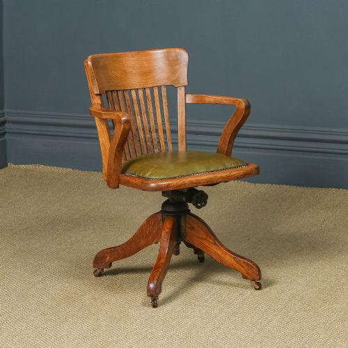Antique English Edwardian Oak & Green Leather Revolving Office Desk Arm Chair by Cooke’s of Finsbury, London (Circa 1910)