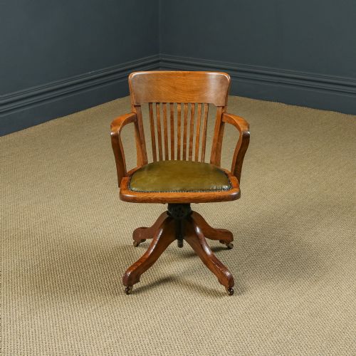 fig 1. Antique English Edwardian Oak & Green Leather Revolving Office Desk Arm Chair by Cooke’s of Finsbury, London (Circa 1910)