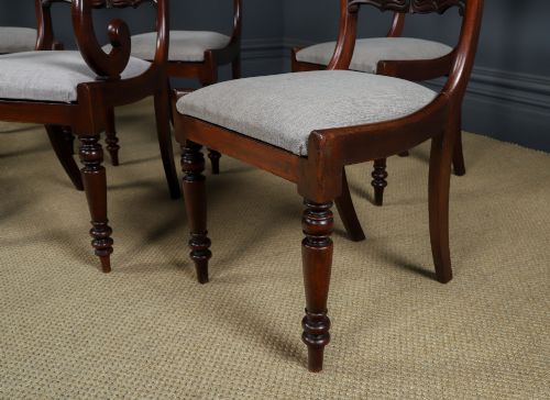 fig 7. A set of six mahogany Regency dining chairs featuring carved back rails, turned front legs, and light-coloured upholstered seats.