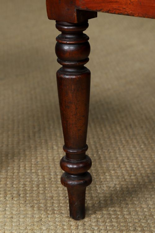A set of six mahogany Regency dining chairs featuring carved back rails, turned front legs, and light-coloured upholstered seats. View XIII